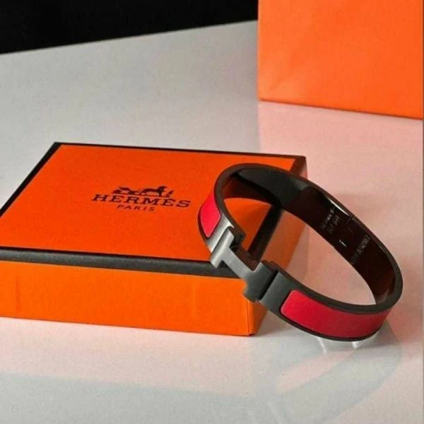 An Elegant Bracelet from Hermes with a Modern Design, Made from Black and Red Metal
